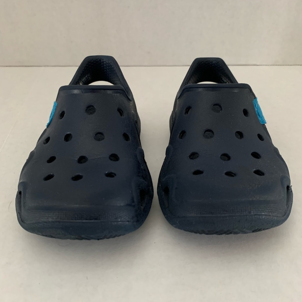 Blue crocs 2 pairs avail: size 6 and 7